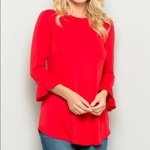 Red blouse with bell sleeves